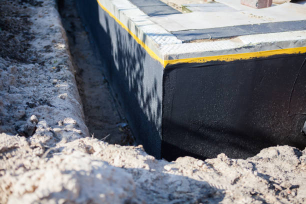 Professional Emergency Waterproofing technician working in Shelby, IN
